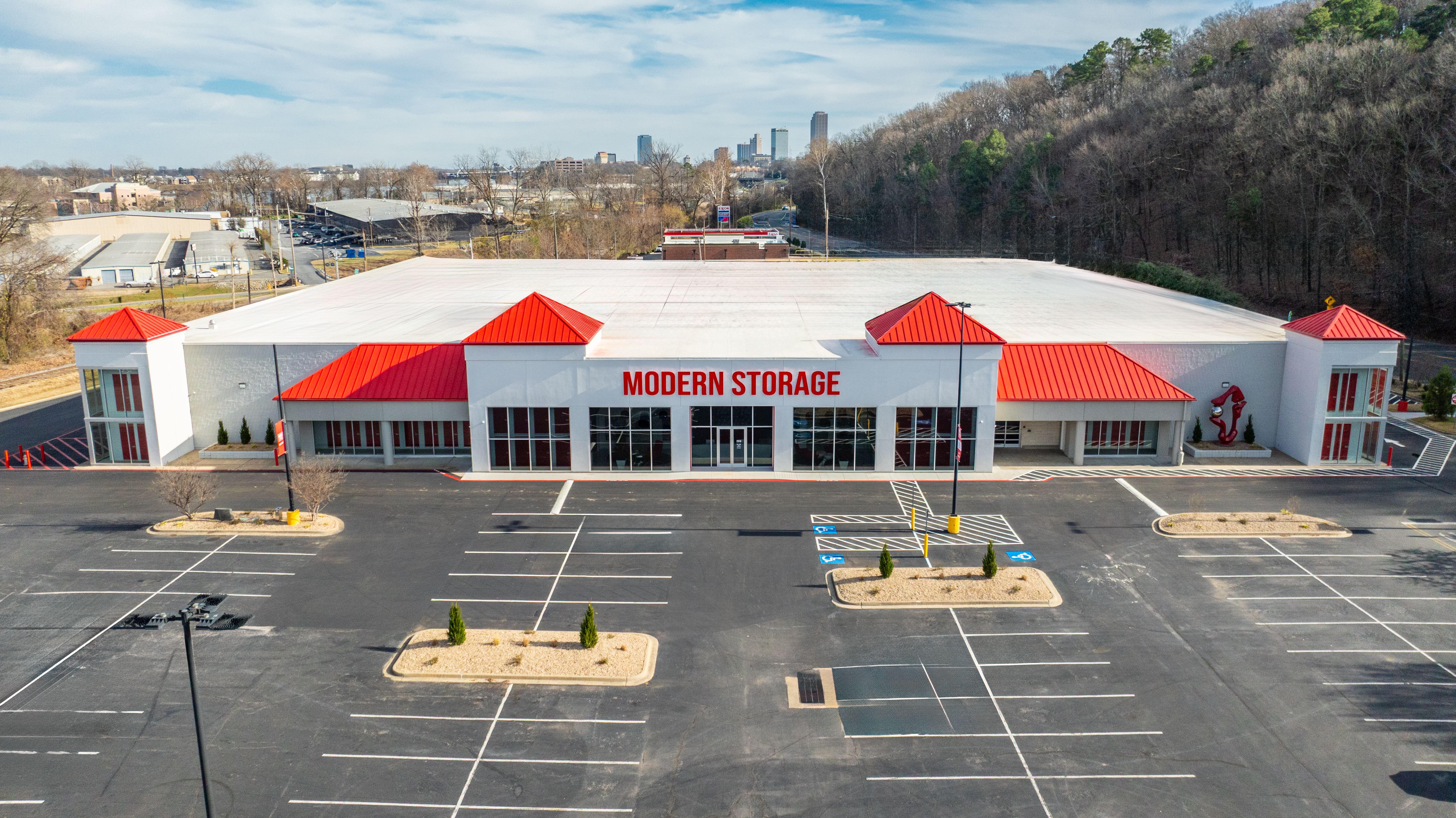 Aerial view of Modern Storage® Riverdale facility with red roof and parking lot